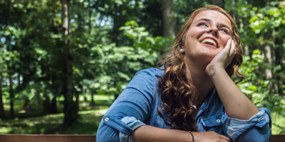 girl smiling outside