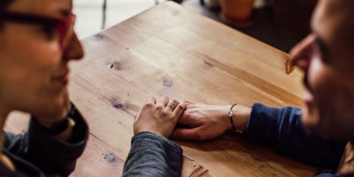 a couple holding hands