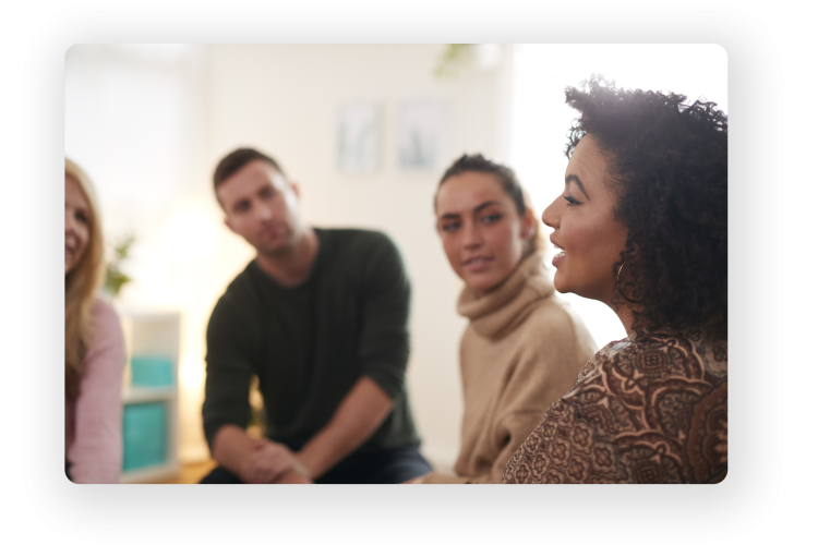 A woman talking to people
