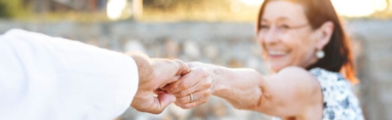 couple reaching to each other