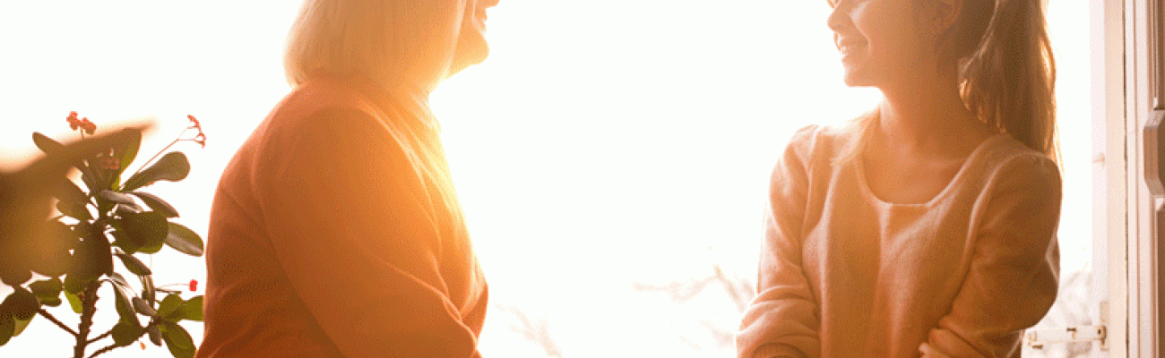 Mom and daughter in sunlight