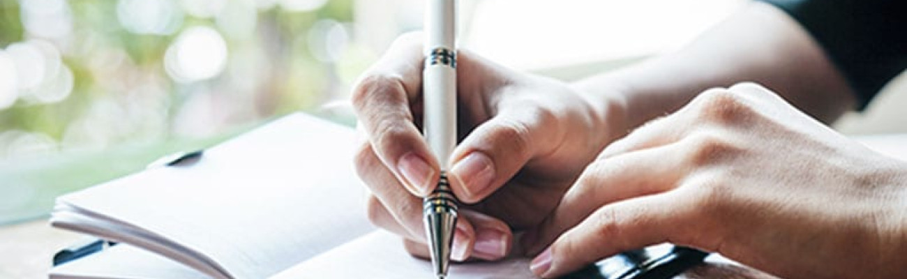 hand writing in a journal