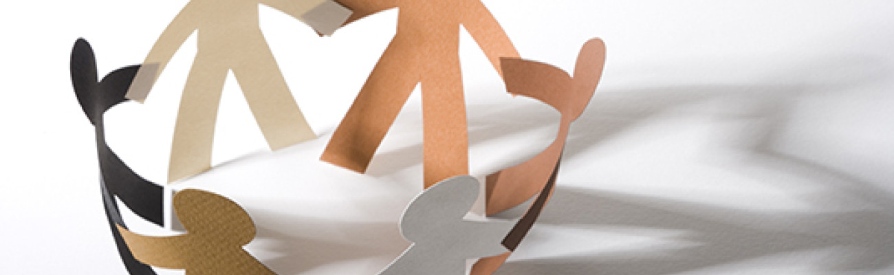 paper dolls holding hands in a circle