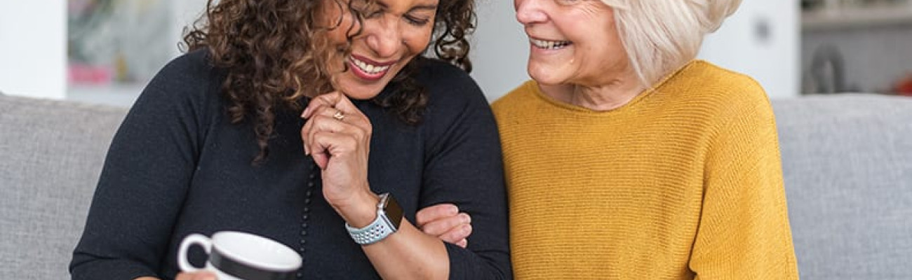 two women laughing