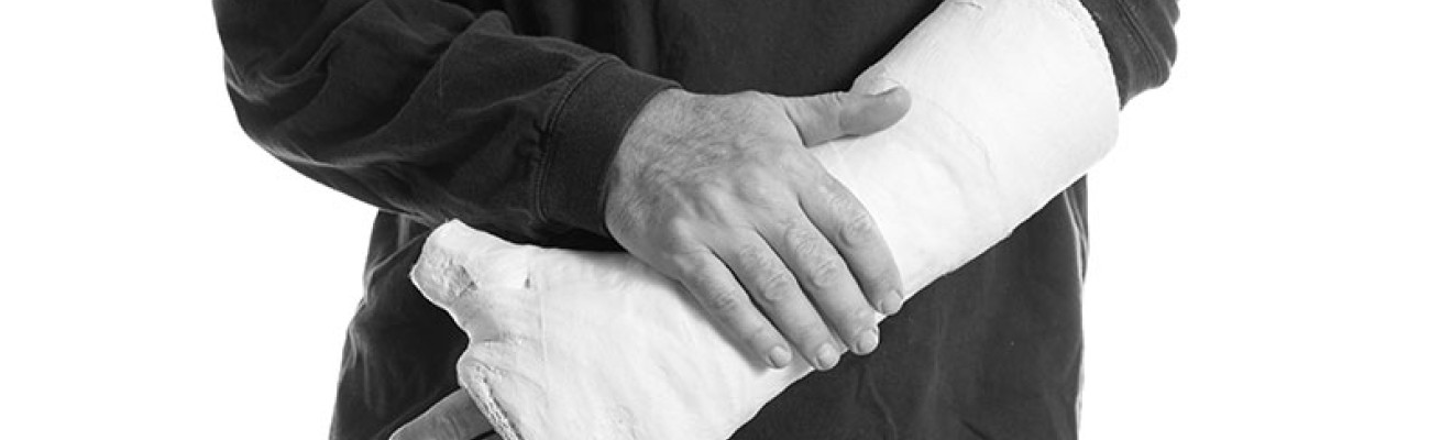 man with broken arm in a cast