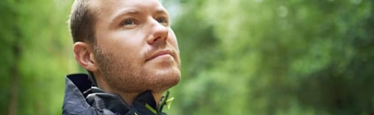 man's face amid nature