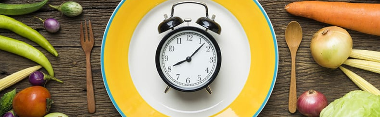 alarm clock on a dinner plate