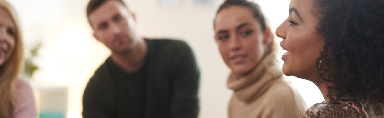Woman talking to a group