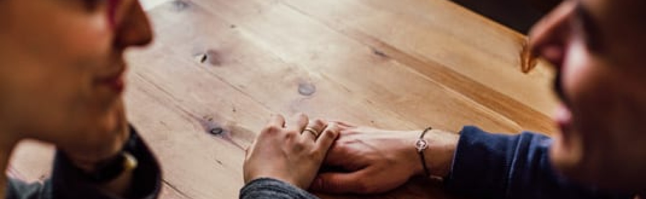 a couple holding hands