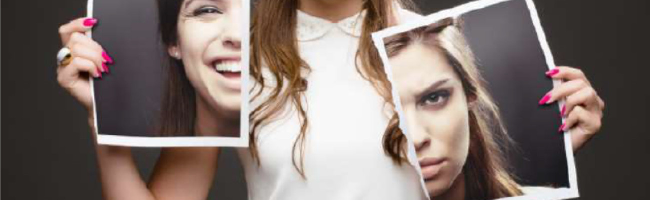 woman holding 2 half photos of herself
