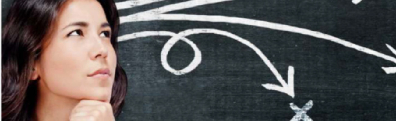 Woman at chalkboard with direction lines going different ways