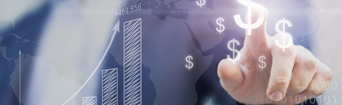 Man in a suit pointing at dollar signs
