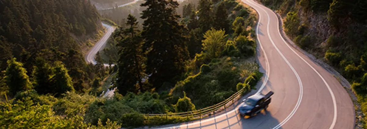 Car driving on a winding road